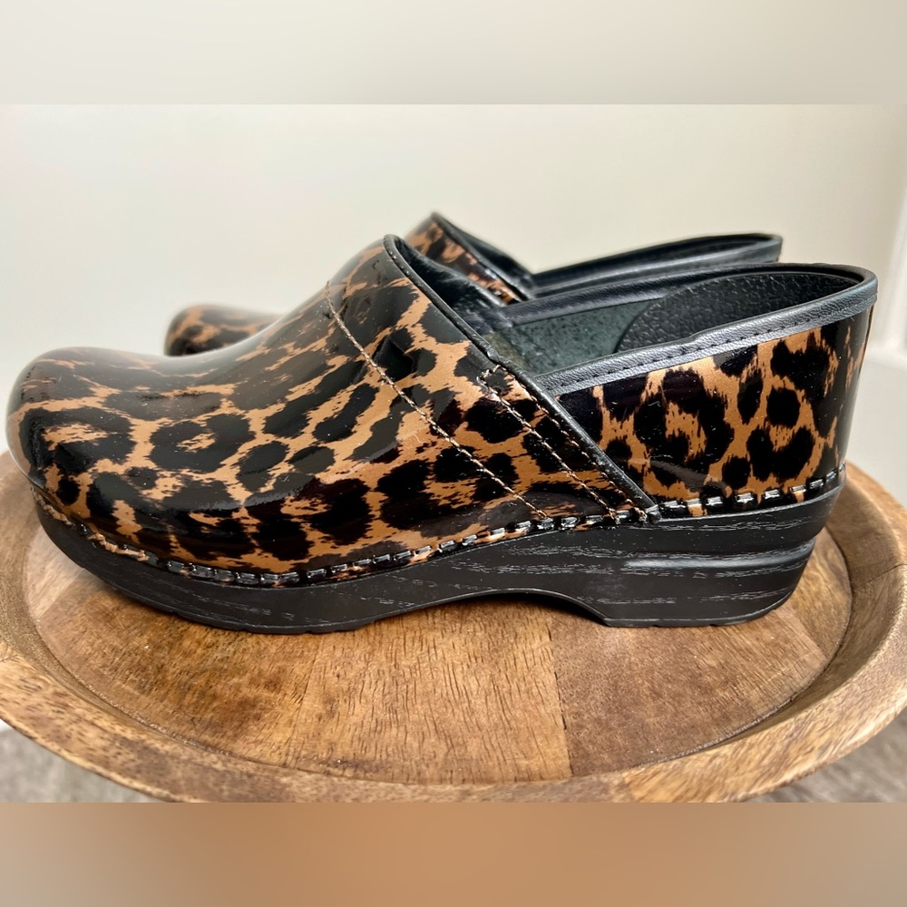 Fabulous Dansko patent leopard clogs